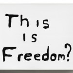 Sam Durant, This is Freedom?, 2008, Electric sign with vinyl text, 63 1/2 x 84 1/2 x 9 1/8 inches Edition of 3. Image courtesy of the artist and Blum & Poe, Los Angeles.