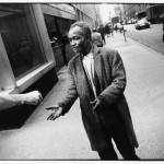 Winogrand, Street Beggar Reaching out to Receive a Donation, 1968