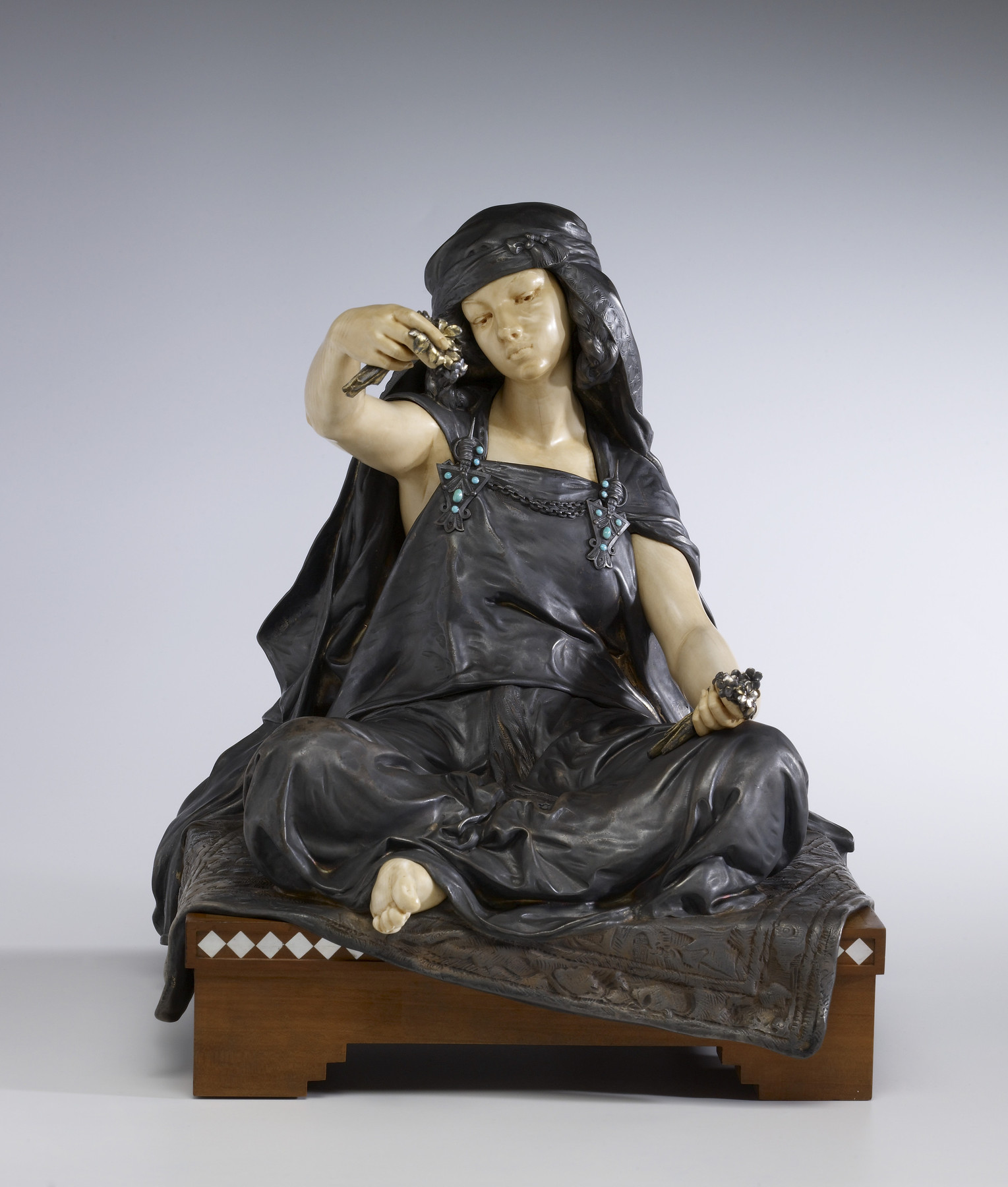 Figure 11. Louis­Ernest Barrias, The Young Girl of Bou Saâda, after 1890, ivory, silveredbronze, wood, mother­of­pearl and turquoise, 12 3/8 × 11 1/4 × 10 1/2 in. Acquired by Henry Walters, 1900, The Walters Art Museum, Baltimore.